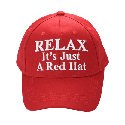 Red cotton baseball cap with white embroidered slogan "Relax It’s Just A Red Hat" and adjustable hook-and-loop strap