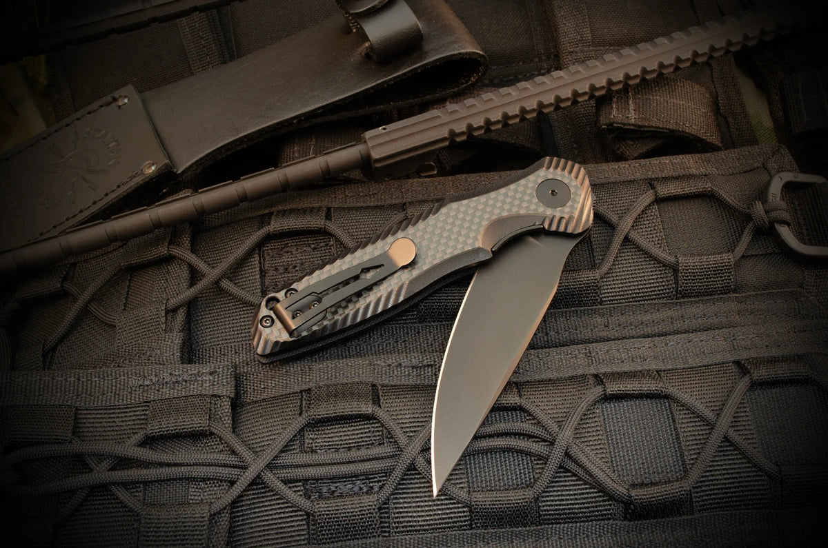 Spartan Blades POROS folding knife clip-side lifestyle view with 154CM blade and carbon fiber G-10 handle